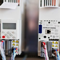 Electrical panel, electric meter and circuit breakers. Electric frequency converter, motor speed controller, rework station.